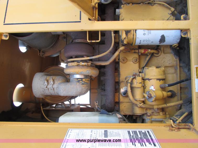 image for item F4016 1994 Champion 720A Series III articulated motor grader