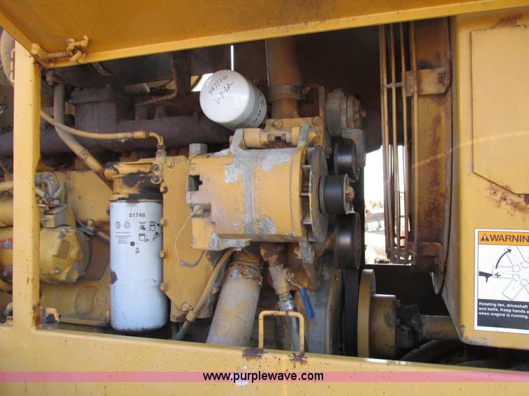 image for item F4016 1994 Champion 720A Series III articulated motor grader