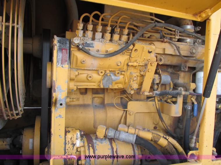 image for item F4016 1994 Champion 720A Series III articulated motor grader