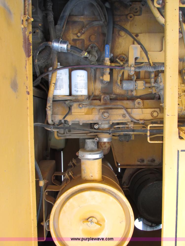 image for item F4016 1994 Champion 720A Series III articulated motor grader