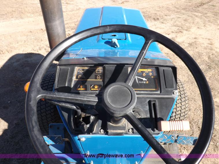 image for item F6272 1993 New Holland 1520 MFWD tractor