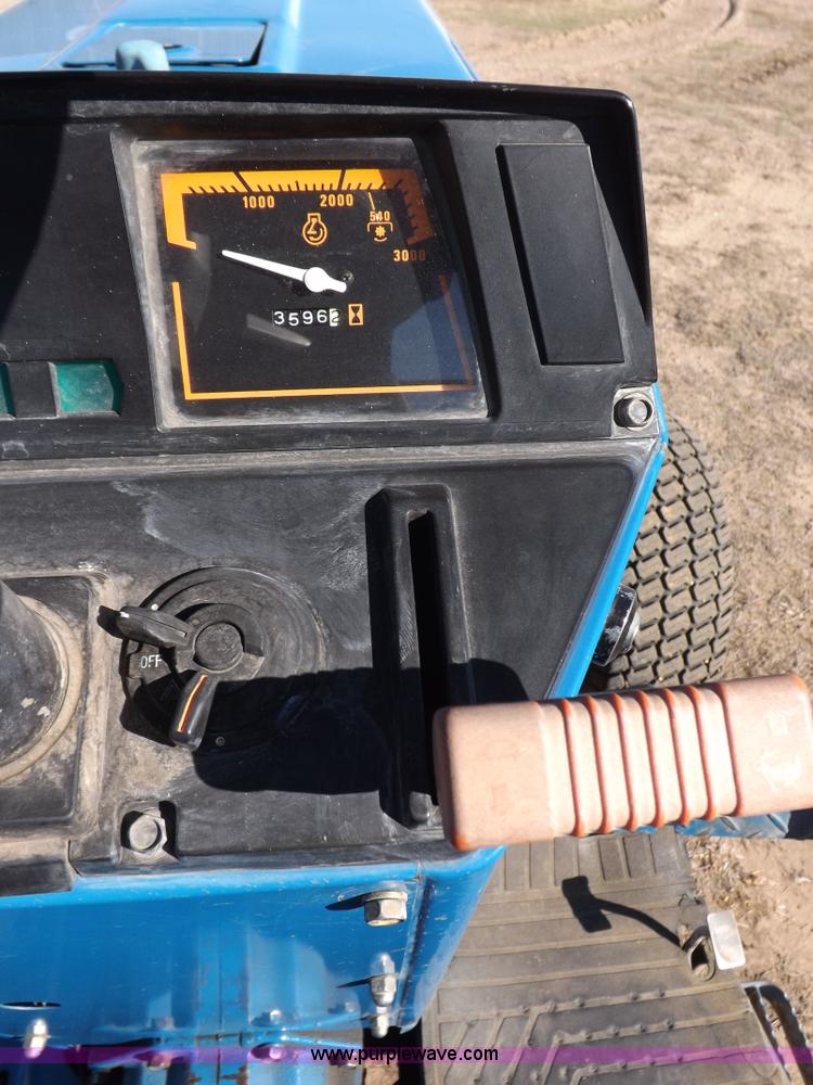 image for item F6272 1993 New Holland 1520 MFWD tractor