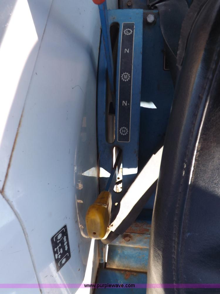 image for item F6272 1993 New Holland 1520 MFWD tractor