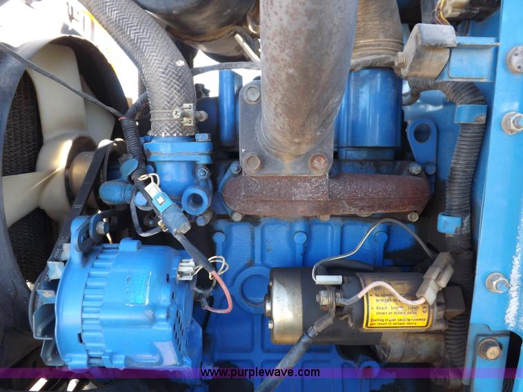 image for item F6272 1993 New Holland 1520 MFWD tractor