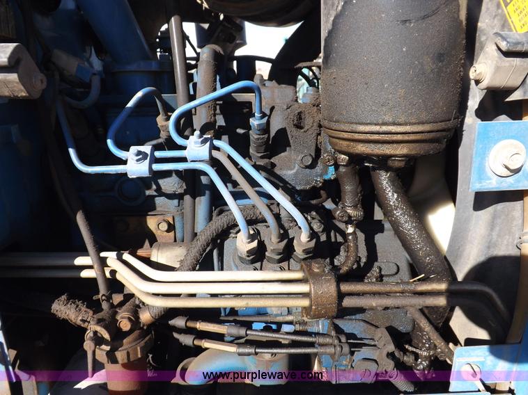 image for item F6272 1993 New Holland 1520 MFWD tractor