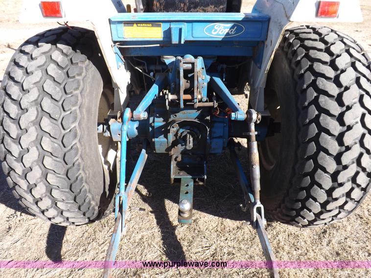 image for item F6272 1993 New Holland 1520 MFWD tractor