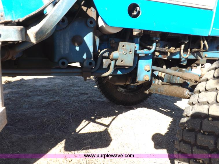 image for item F6272 1993 New Holland 1520 MFWD tractor