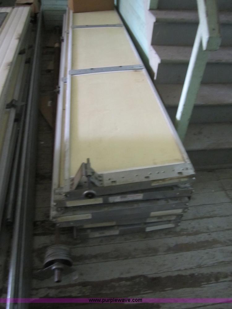 image for item H9858 (3) 10' x 10' garage doors