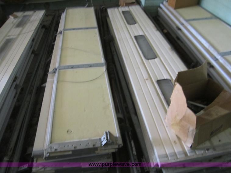 image for item H9858 (3) 10' x 10' garage doors