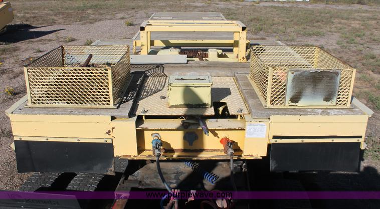 image for item F6110 1976 Wisconsin 40' drop deck trailer