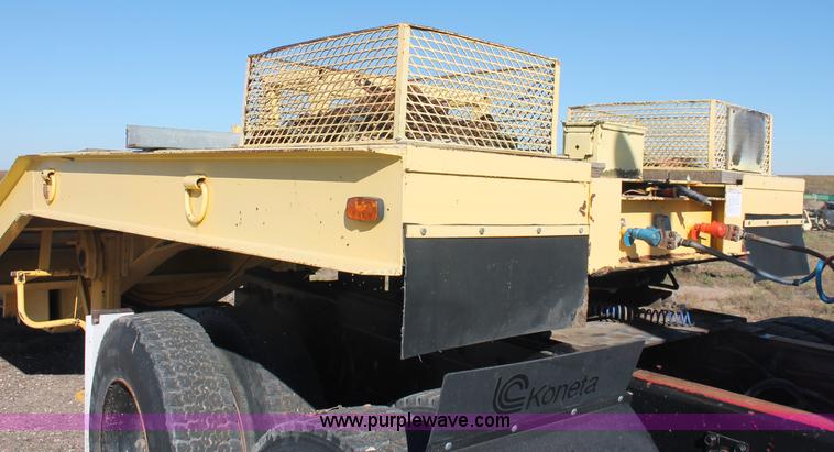 image for item F6110 1976 Wisconsin 40' drop deck trailer