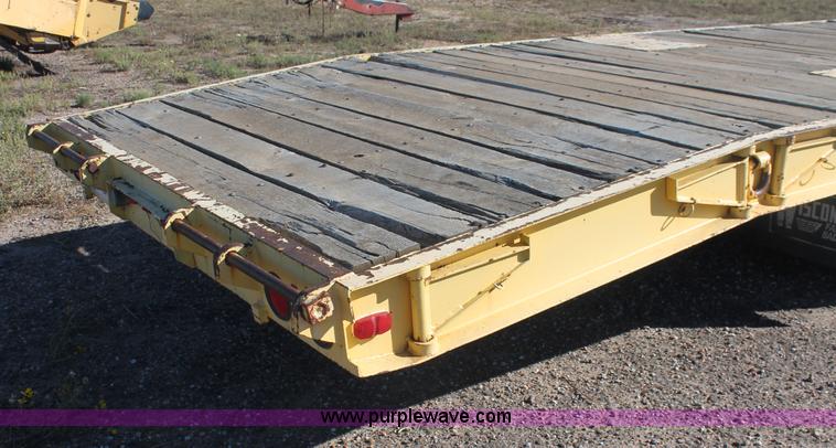 image for item F6110 1976 Wisconsin 40' drop deck trailer