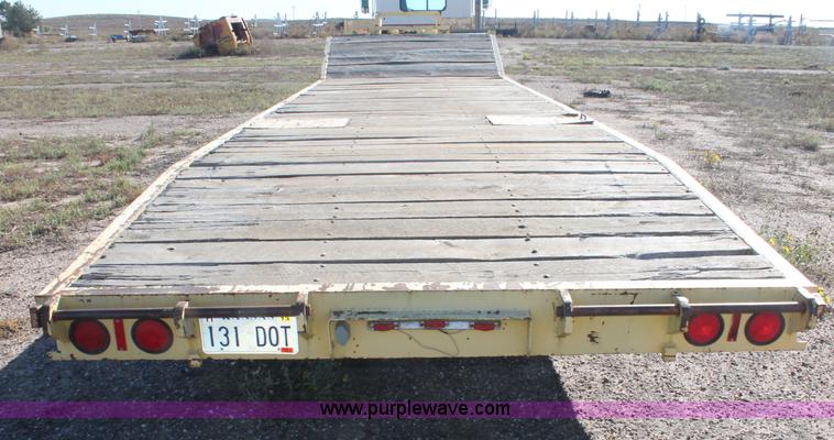 image for item F6110 1976 Wisconsin 40' drop deck trailer