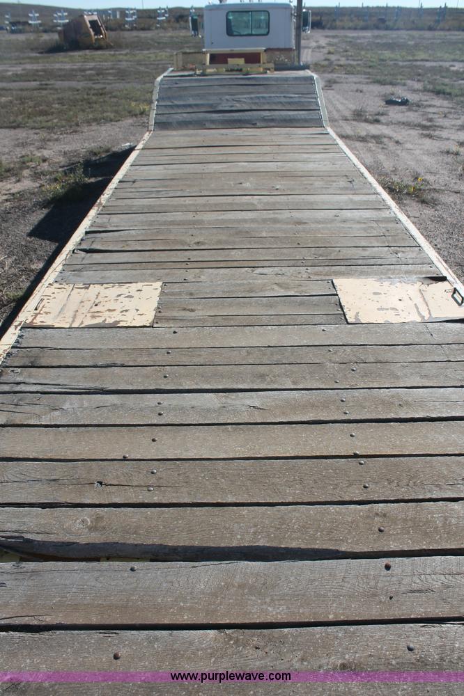 image for item F6110 1976 Wisconsin 40' drop deck trailer