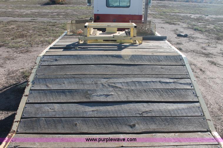 image for item F6110 1976 Wisconsin 40' drop deck trailer