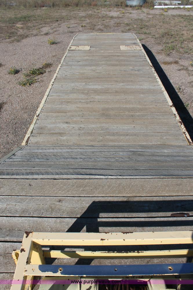 image for item F6110 1976 Wisconsin 40' drop deck trailer