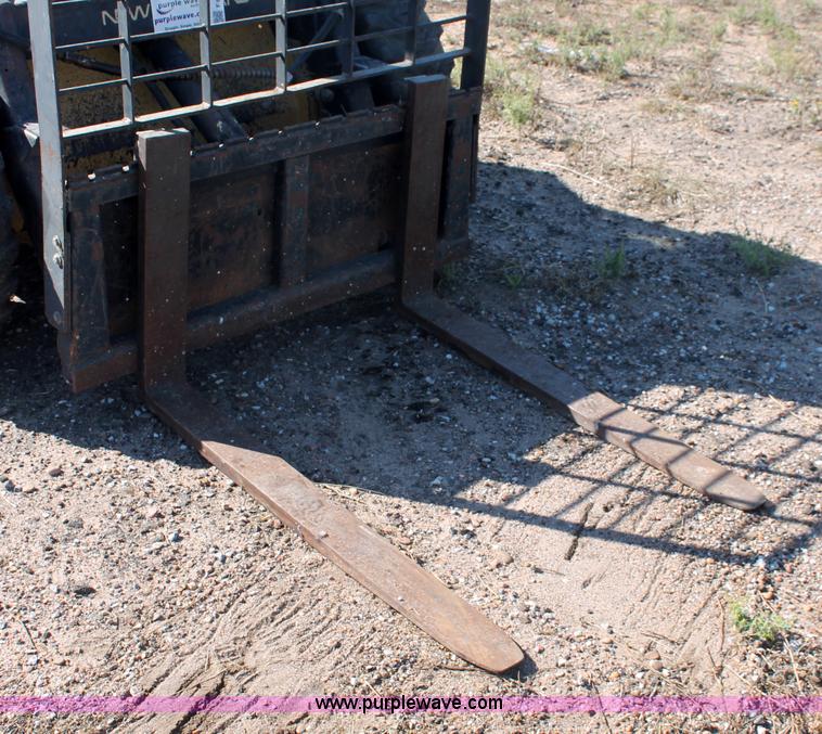 image for item F6137 1988 New Holland L553 skid steer