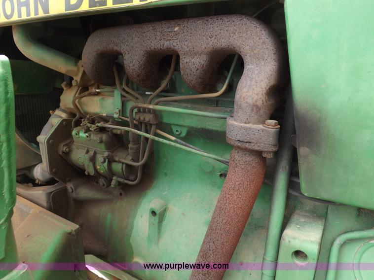 image for item F6233 1983 John Deere 2550 MFWD tractor