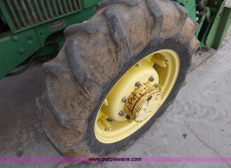 image for item F6233 1983 John Deere 2550 MFWD tractor