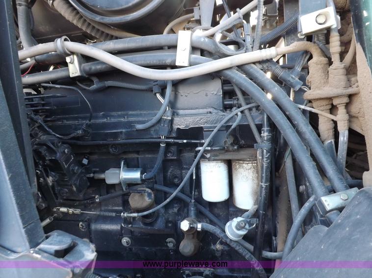 image for item F6242 White 8610 MFWD tractor