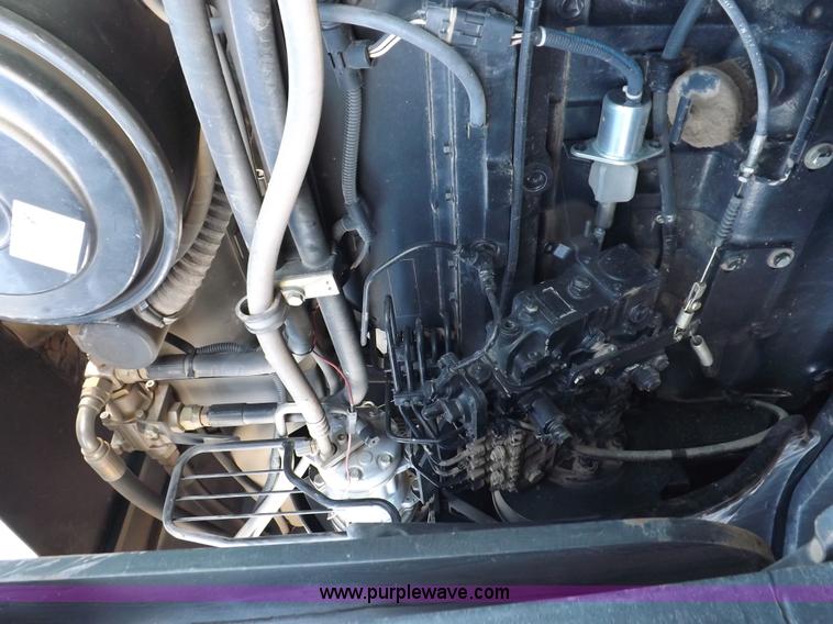 image for item F6242 White 8610 MFWD tractor