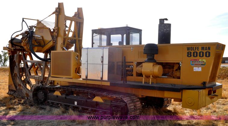 image for item C3043 2010 Wolfe Man 8000 wheel trencher