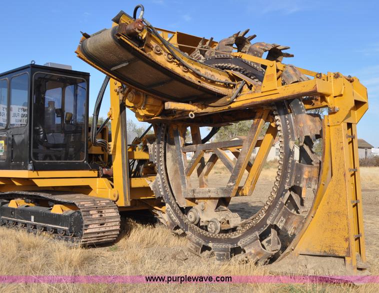 image for item C3043 2010 Wolfe Man 8000 wheel trencher