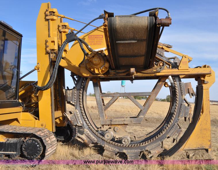 image for item C3043 2010 Wolfe Man 8000 wheel trencher