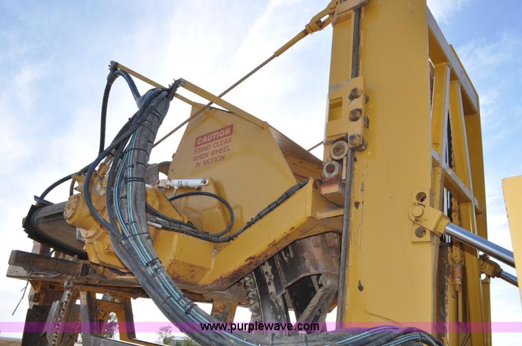 image for item C3043 2010 Wolfe Man 8000 wheel trencher