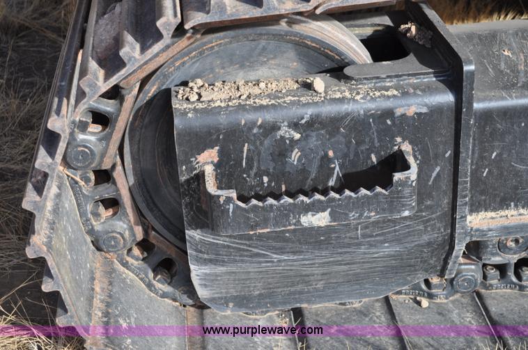 image for item C3043 2010 Wolfe Man 8000 wheel trencher