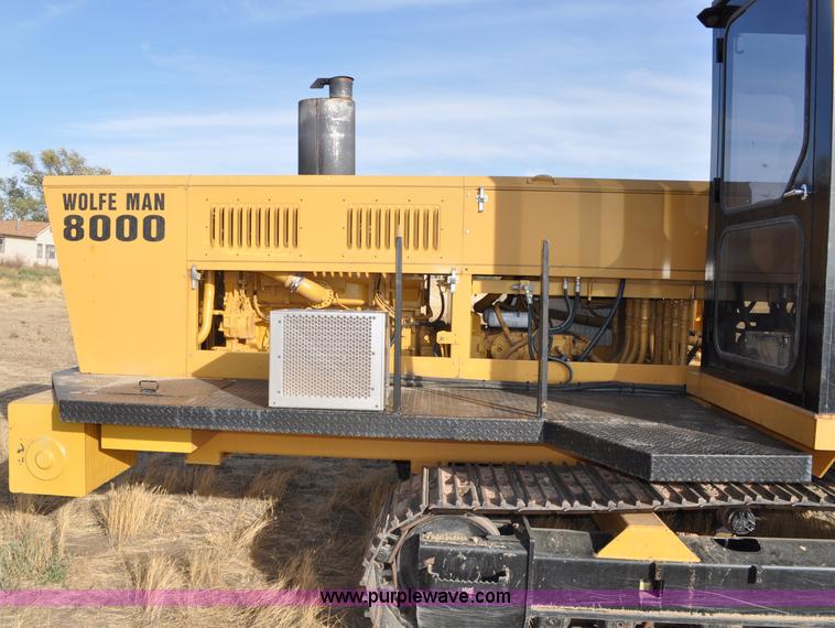 image for item C3043 2010 Wolfe Man 8000 wheel trencher