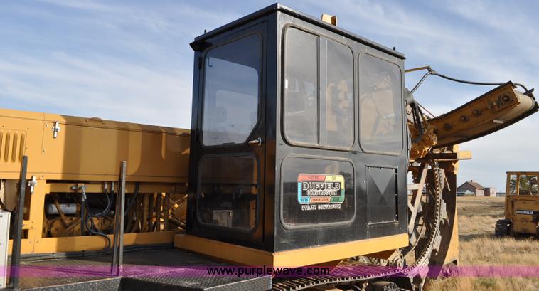 image for item C3043 2010 Wolfe Man 8000 wheel trencher