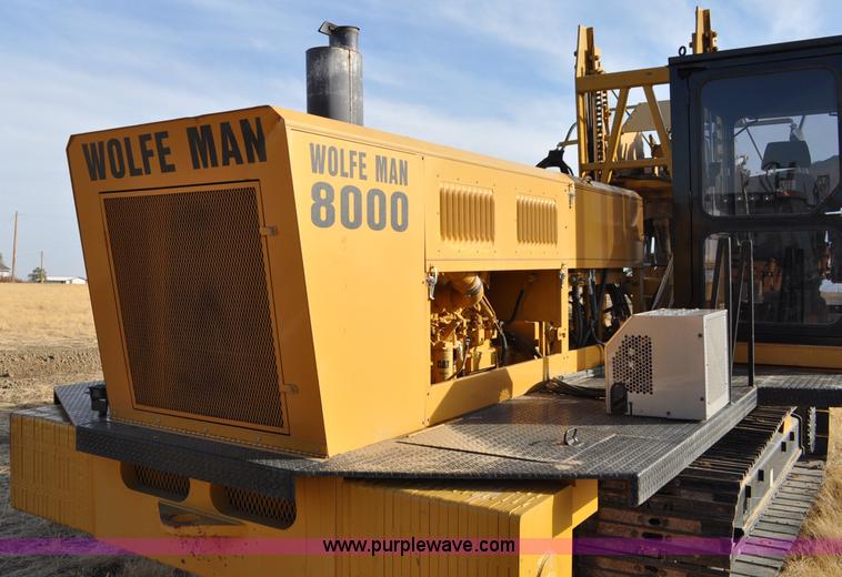 image for item C3043 2010 Wolfe Man 8000 wheel trencher