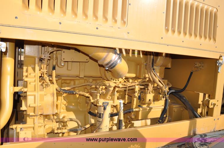 image for item C3043 2010 Wolfe Man 8000 wheel trencher