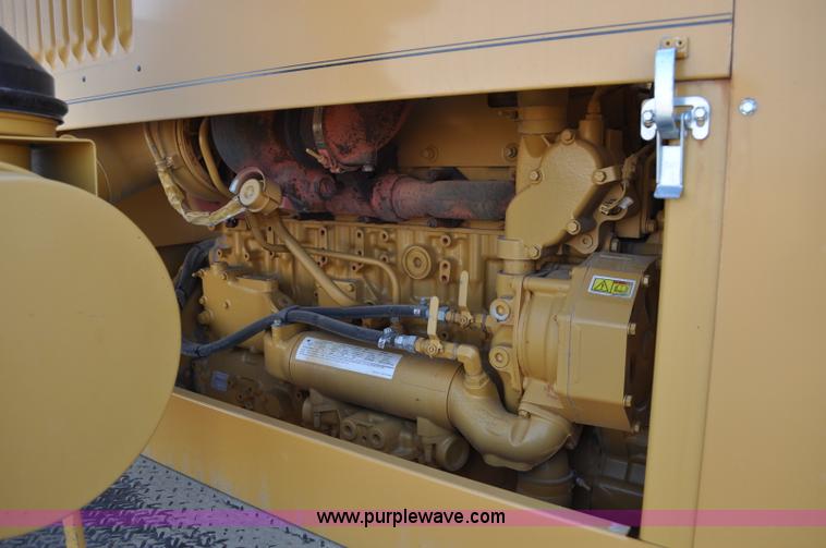 image for item C3043 2010 Wolfe Man 8000 wheel trencher