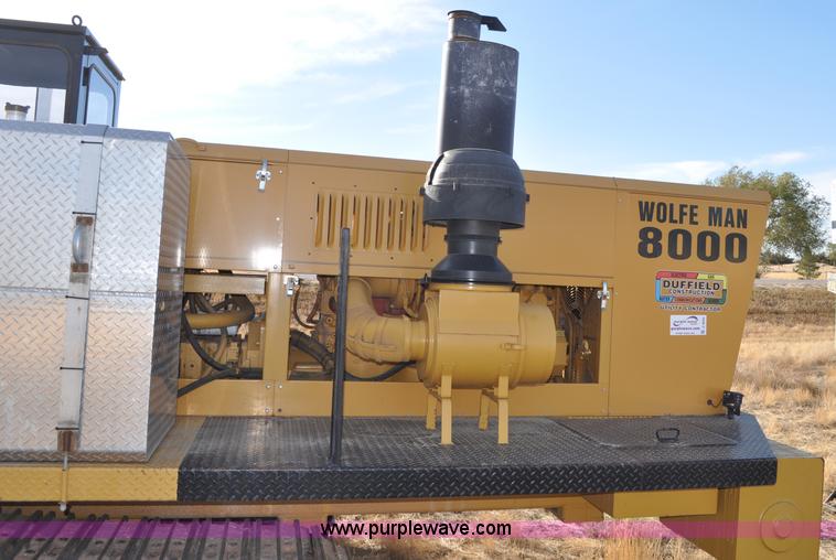 image for item C3043 2010 Wolfe Man 8000 wheel trencher