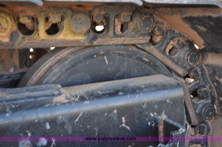 image for item C3043 2010 Wolfe Man 8000 wheel trencher