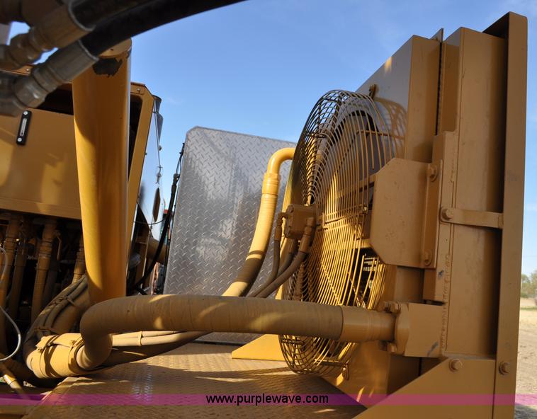 image for item C3043 2010 Wolfe Man 8000 wheel trencher