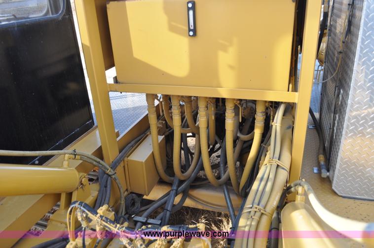 image for item C3043 2010 Wolfe Man 8000 wheel trencher