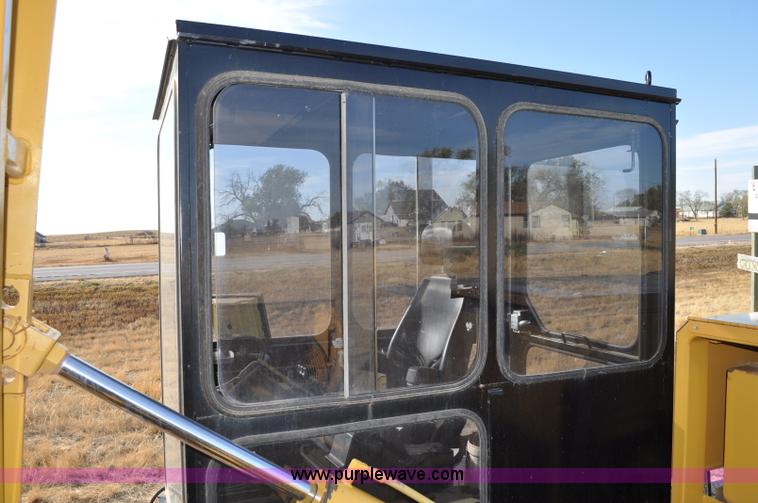 image for item C3043 2010 Wolfe Man 8000 wheel trencher