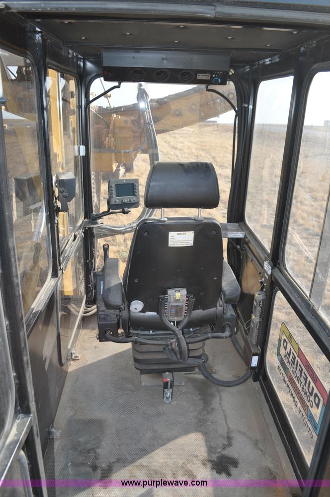 image for item C3043 2010 Wolfe Man 8000 wheel trencher