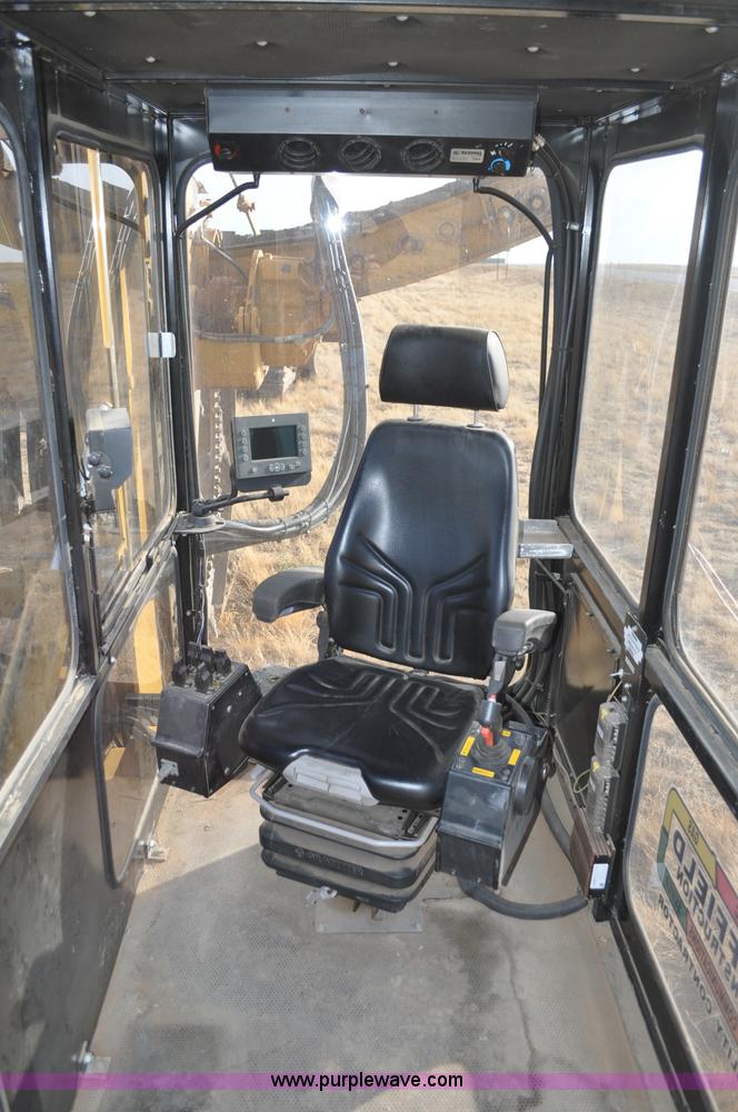 image for item C3043 2010 Wolfe Man 8000 wheel trencher