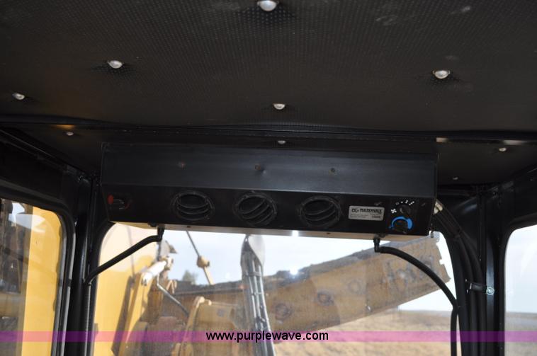 image for item C3043 2010 Wolfe Man 8000 wheel trencher