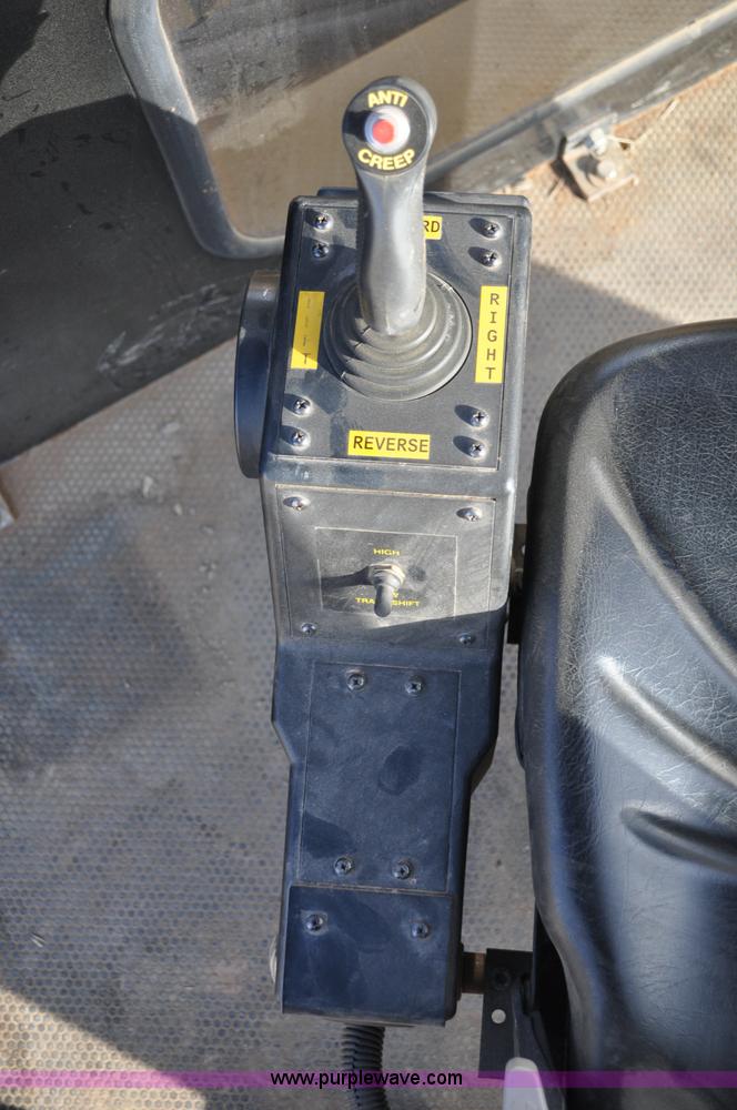 image for item C3043 2010 Wolfe Man 8000 wheel trencher