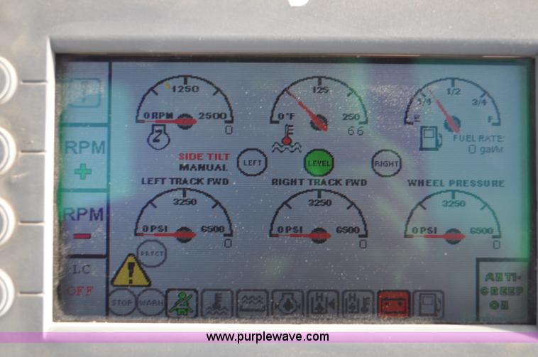 image for item C3043 2010 Wolfe Man 8000 wheel trencher