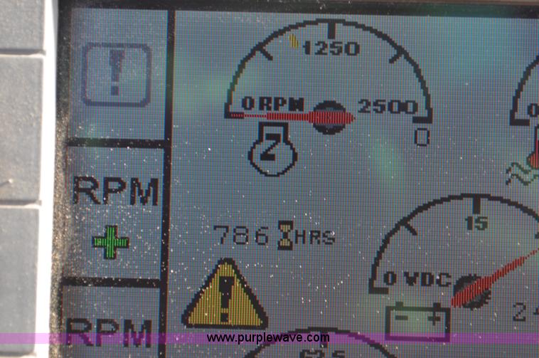 image for item C3043 2010 Wolfe Man 8000 wheel trencher