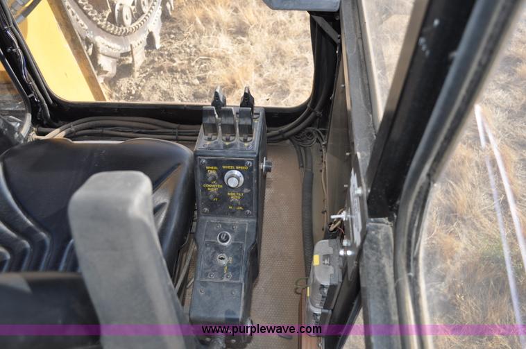 image for item C3043 2010 Wolfe Man 8000 wheel trencher