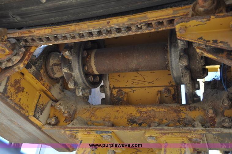 image for item C3043 2010 Wolfe Man 8000 wheel trencher