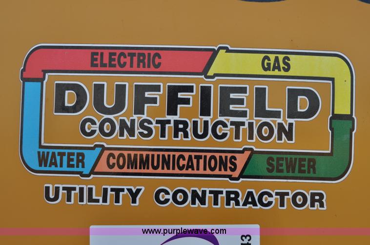 image for item C3043 2010 Wolfe Man 8000 wheel trencher