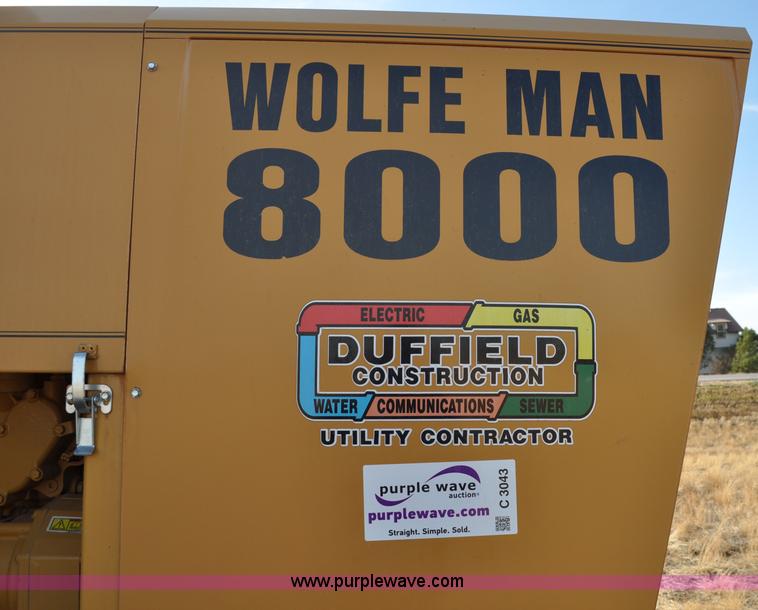 image for item C3043 2010 Wolfe Man 8000 wheel trencher